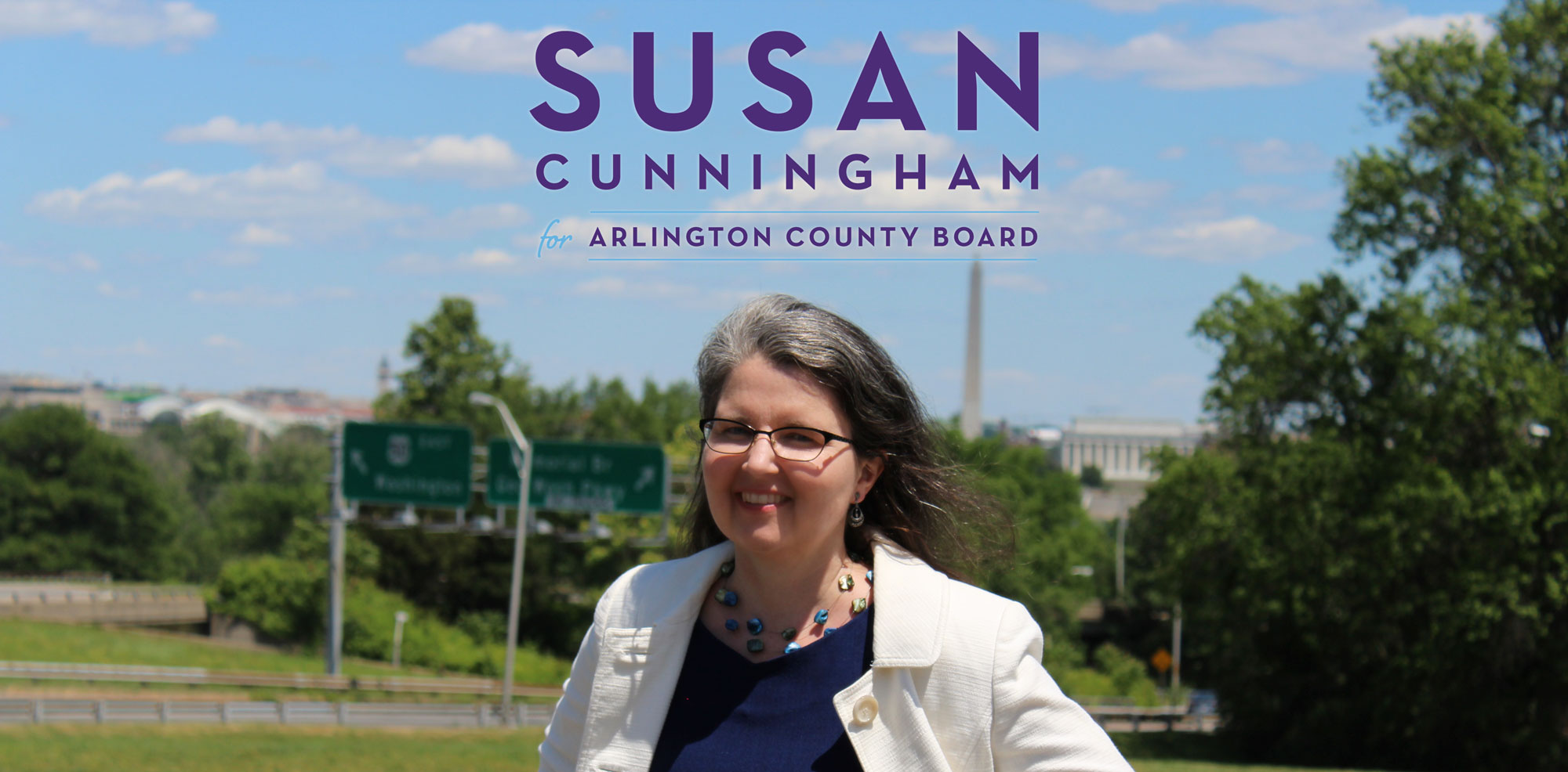 Susan for Arlington, image shows county commission candidate with DC skyline in background